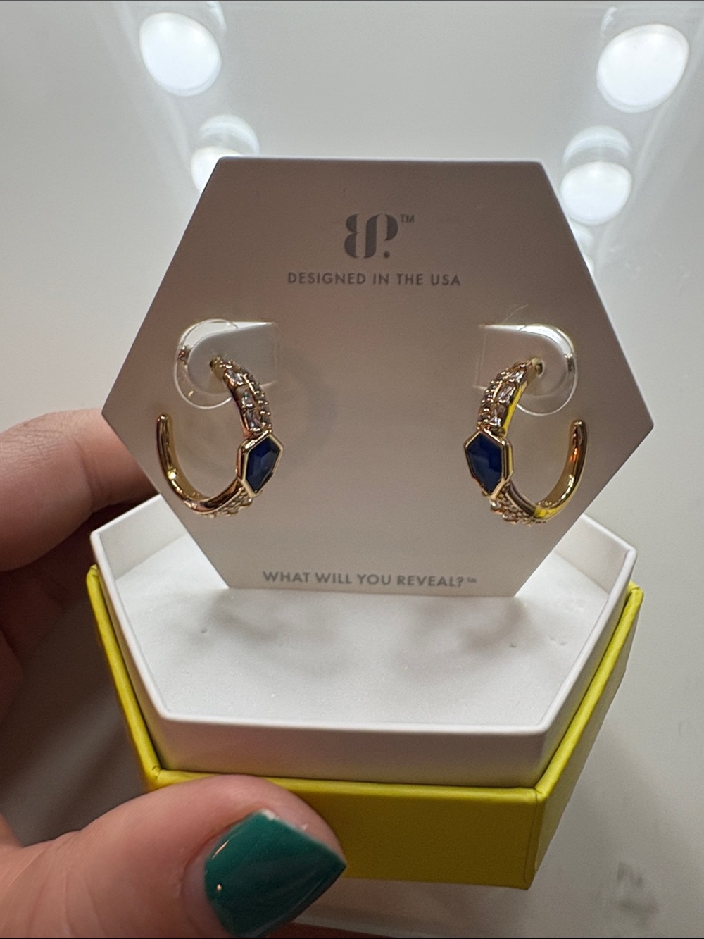 Bomb Party Gold Hoop Earrings with Blue Stone Accents